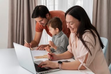 A stay-at-home mom working on a laptop while a dad and child engage in activities, highlighting ways to make money from home and balance family life.